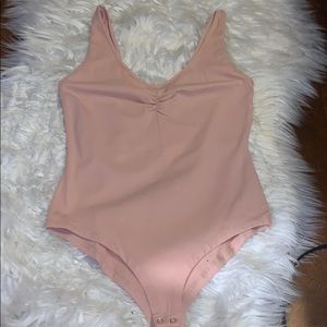 Pink bodysuit